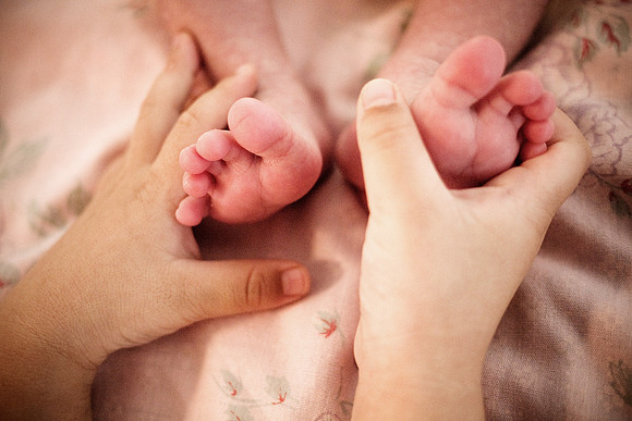 Aaron's feet, Ryan's hand